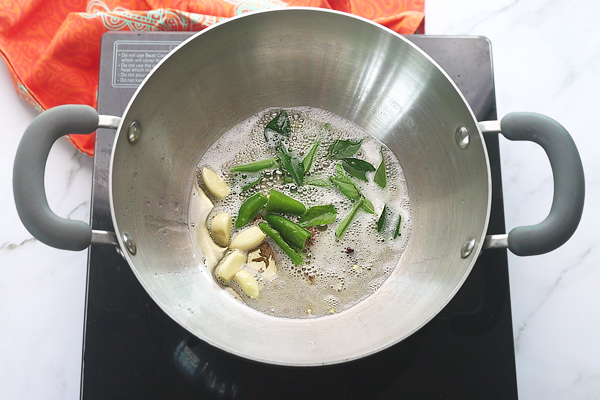 add curry leaves and garlic
